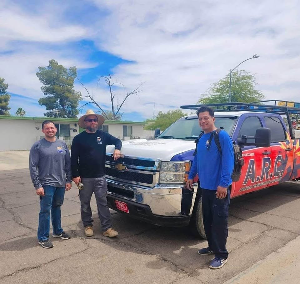 Arizona Refrigeration team standing with an ARC service truck