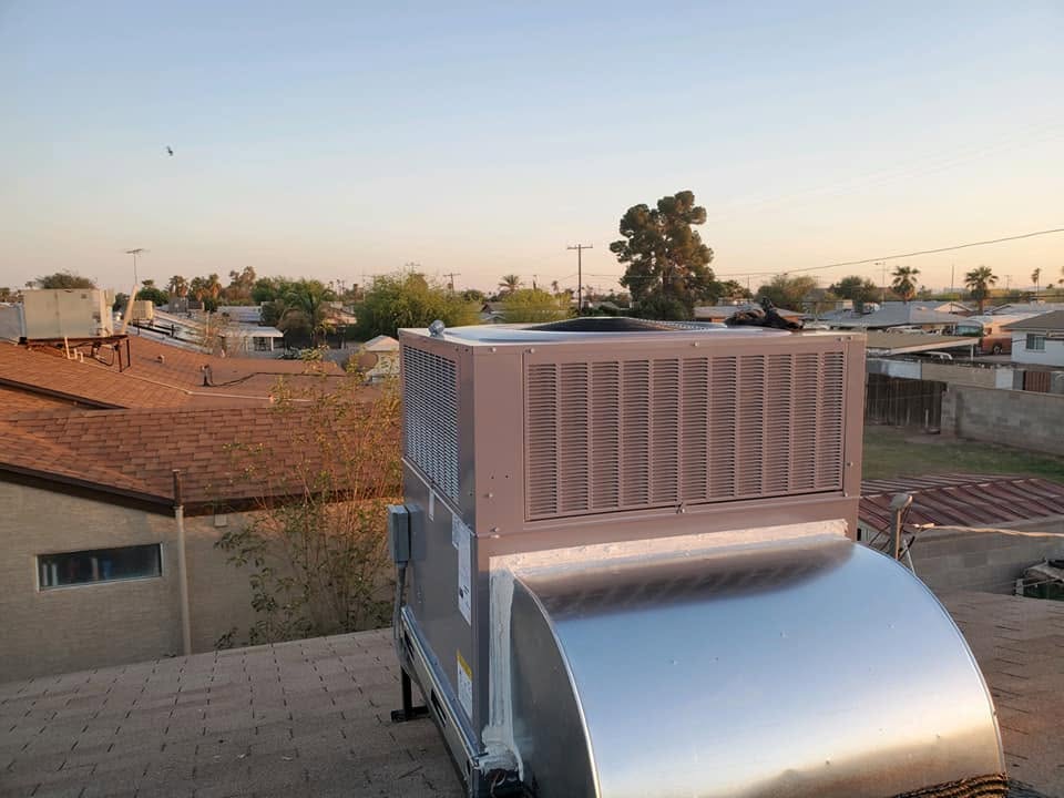 Rooftop packaged HVAC unit with new sheet-metal ductwork